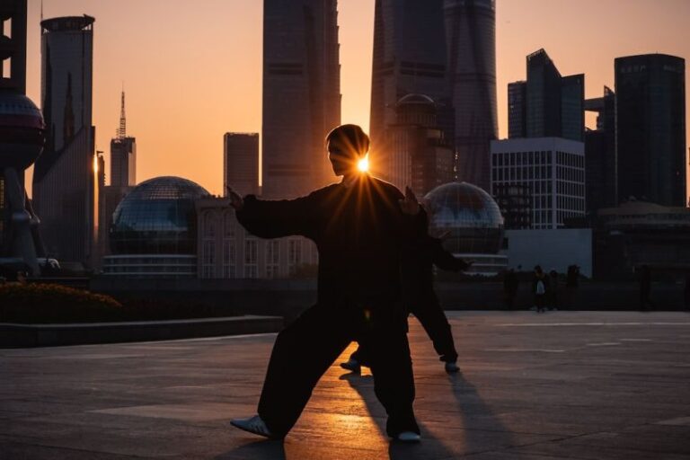 Tai Chi - silhouette of man near buildings