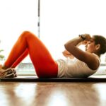 Workouts - woman exercising indoors