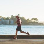 Exercises - man running near sea during daytime